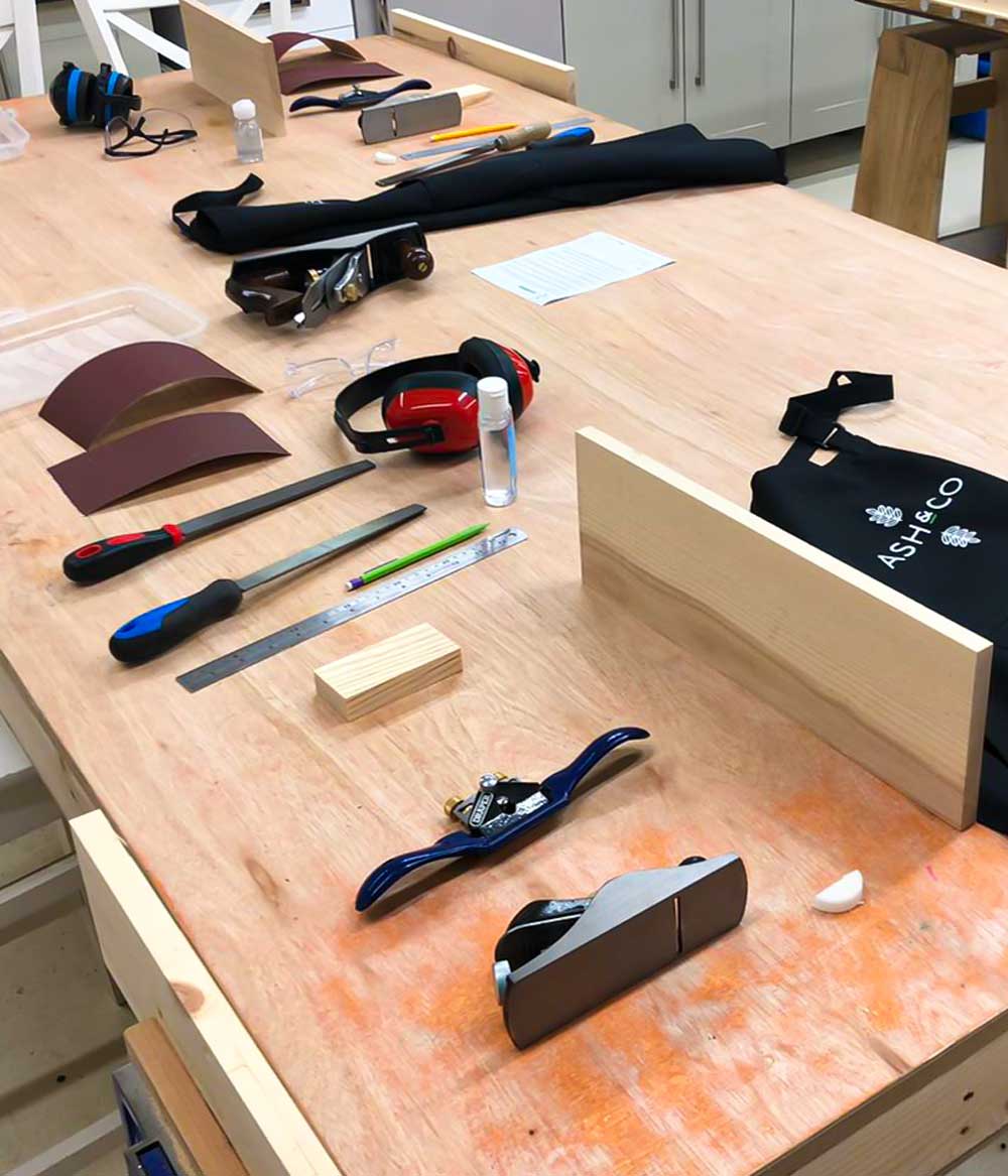 Make a wooden cutting board and learn how to use a range of hand tools at a one-day beginners woodworking course at Ash & Co Workshops in Hampshire.