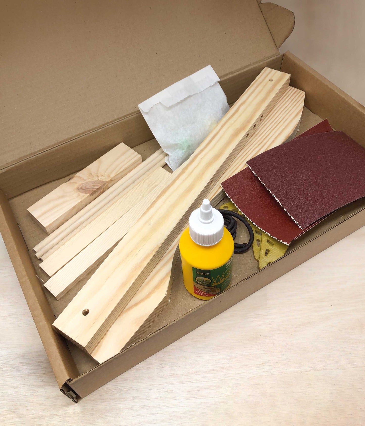 Beginners woodworking kit make a toy crossbow and learn woodwork skills at home.