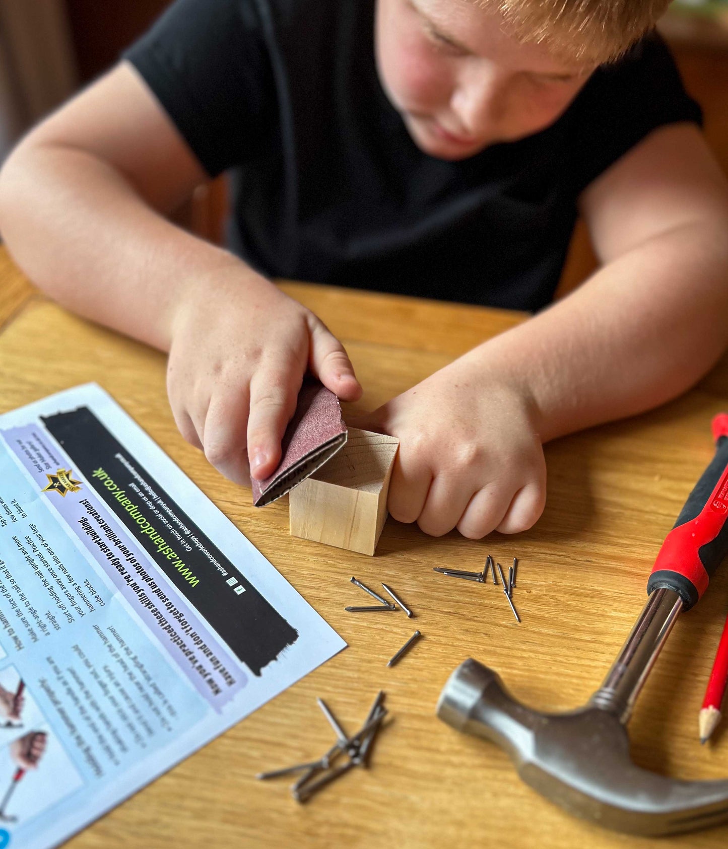 Young Woodworkers Hammer and Nails Projects - Make-at-home woodwork kit for kids - Sanding the woodwork project