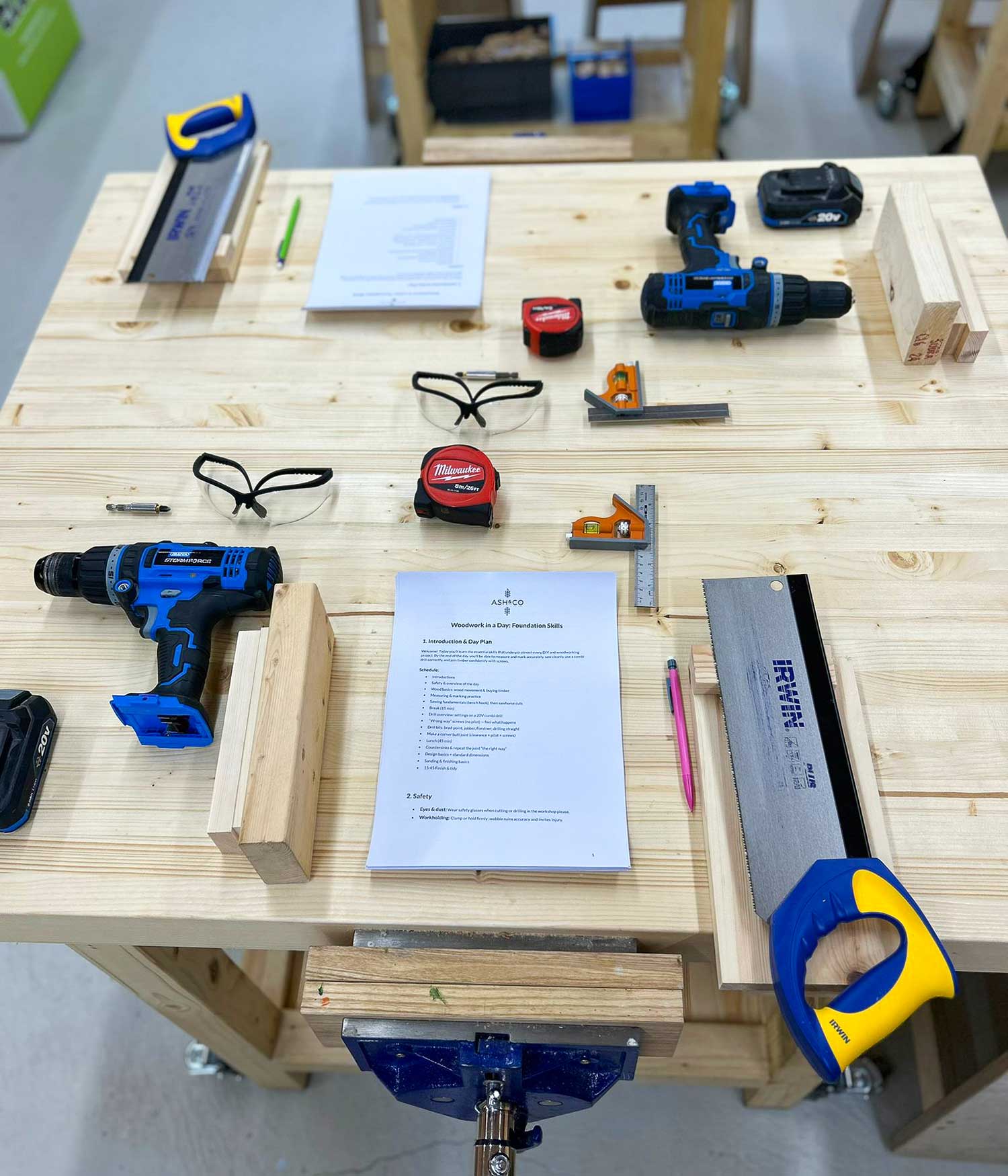 Woodworking tools and materials on a wooden workbench ready for a beginners woodwork course at Ash and Co Workshops