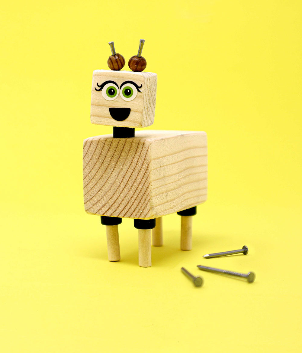 Educational woodwork kit for children by Ash & Co - build a cute llama and teach kids how to use a hammer and nails with this beginners woodworking project set.