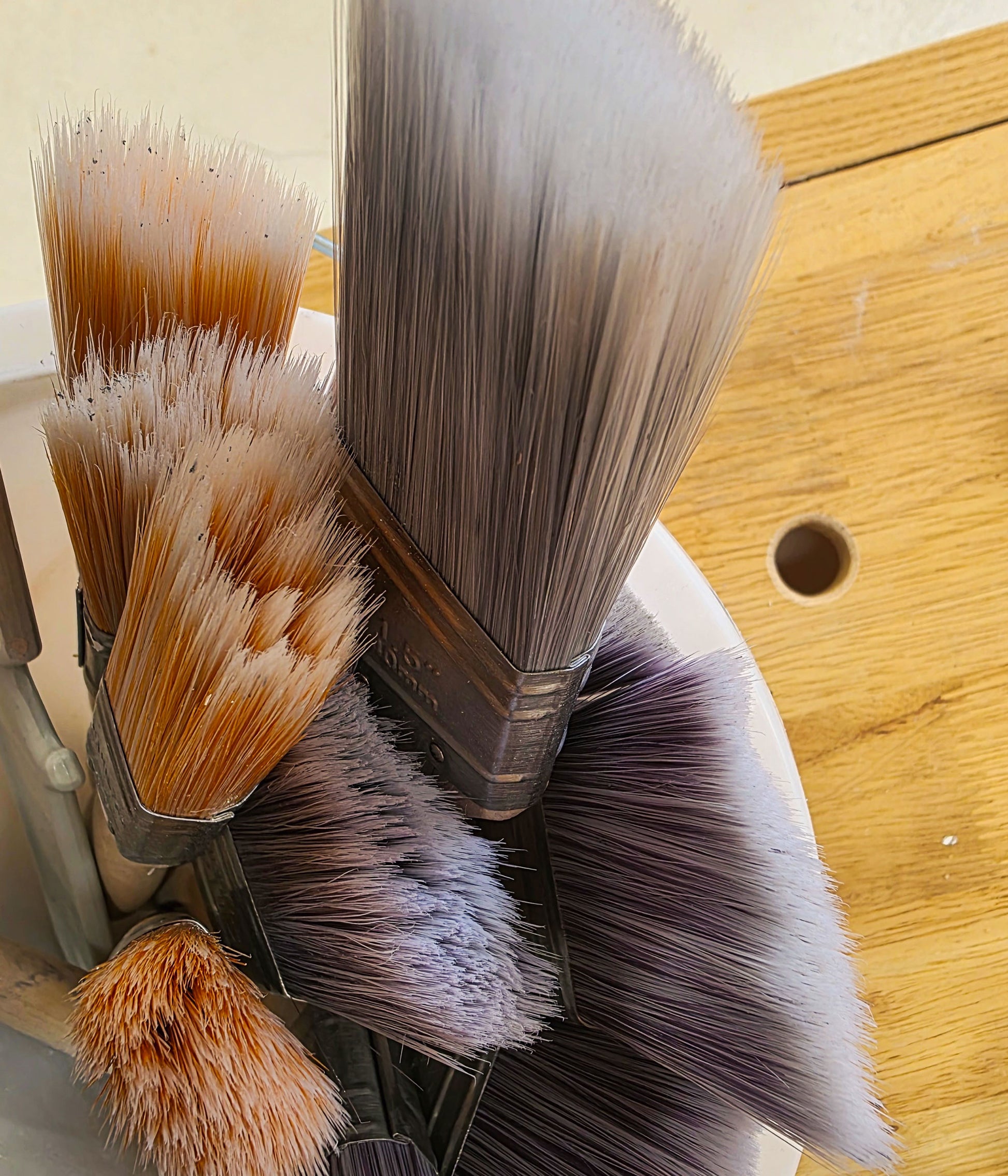 Professional decorating brushes used for cutting in and detailed paintwork on the Decorate in a Day beginner decorating workshop.