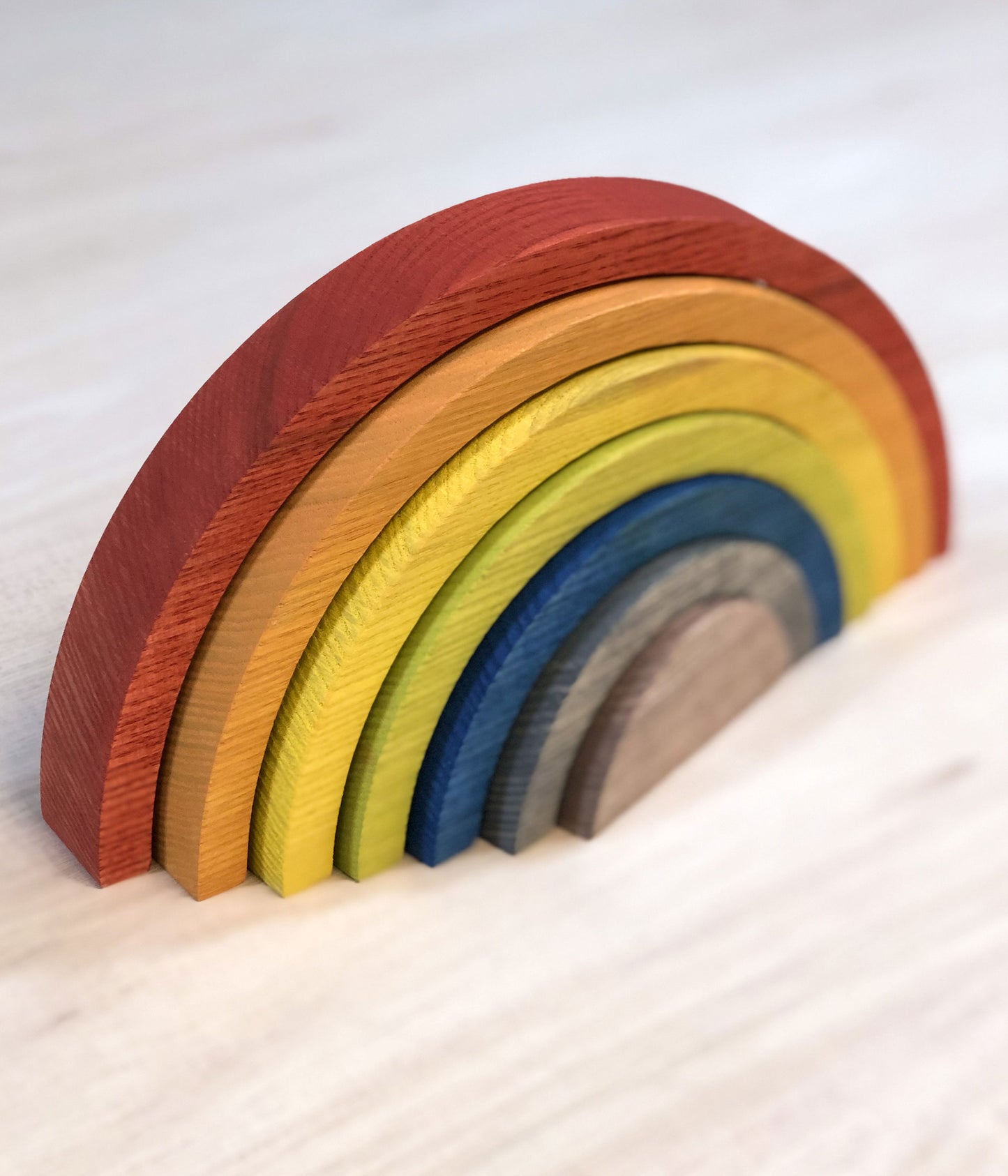 Make a solid wood rainbow at home with this woodworking kit for kids and adults